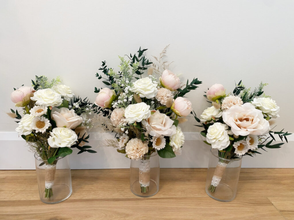 Set of bridal bouquet and two bridesmaid bouquets