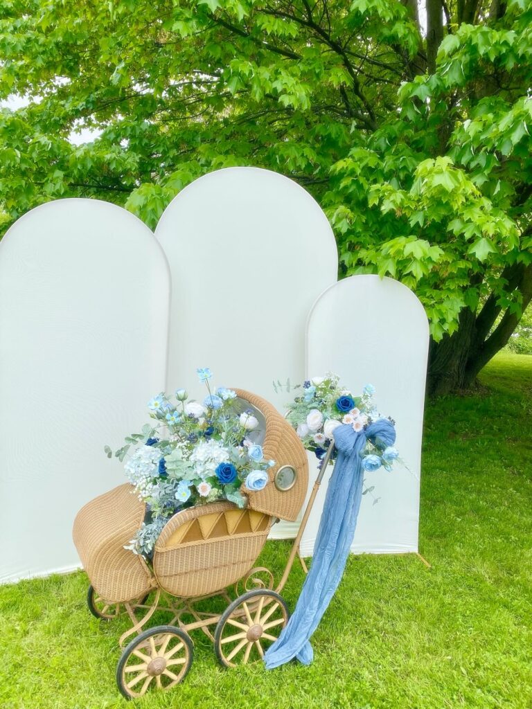 Flower arrangement in vintage baby stroller