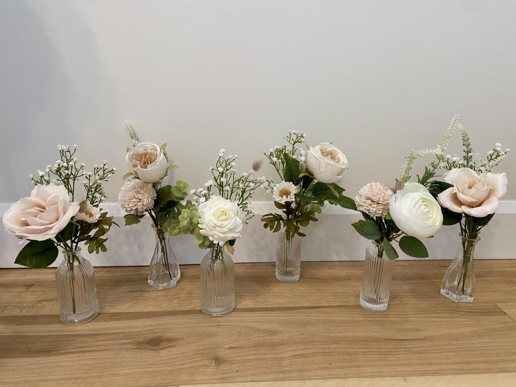 Bud vases using ivory and blush florals
