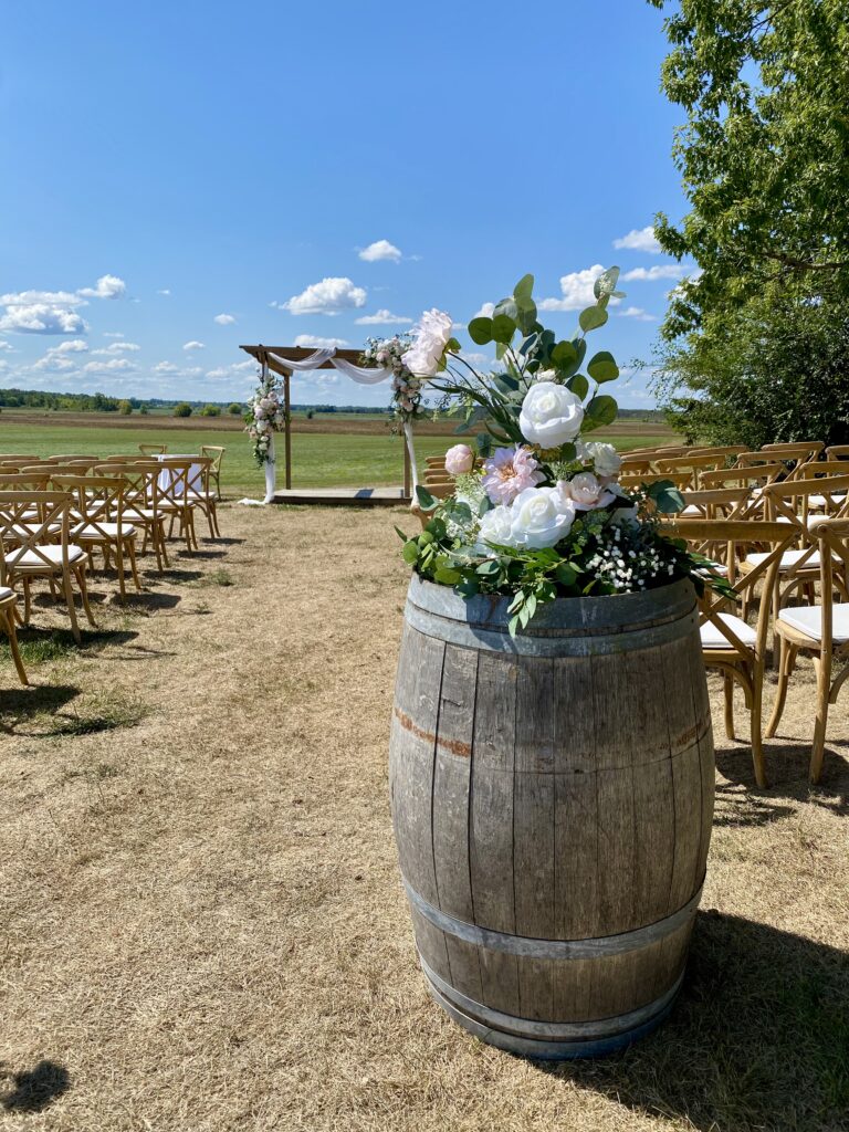 Barrel arrangement using ivory and blush florals