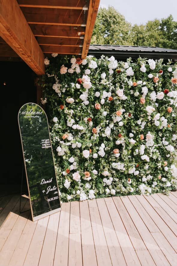 Floral wall with pink flowers installed at Mallity Estate.