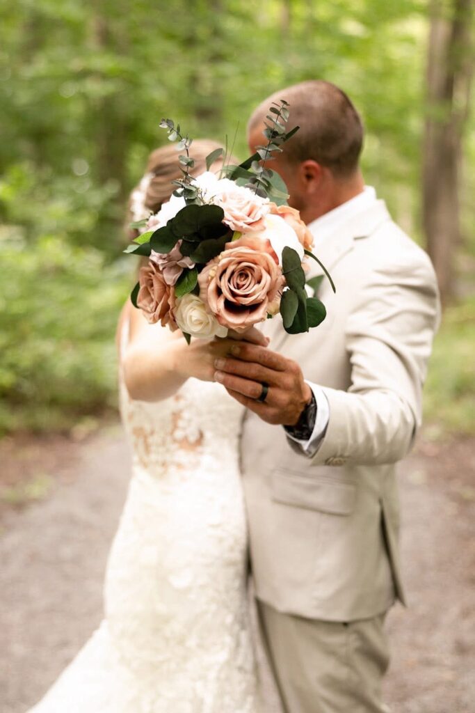 Bridal bouquet using pink, ivory and greenery