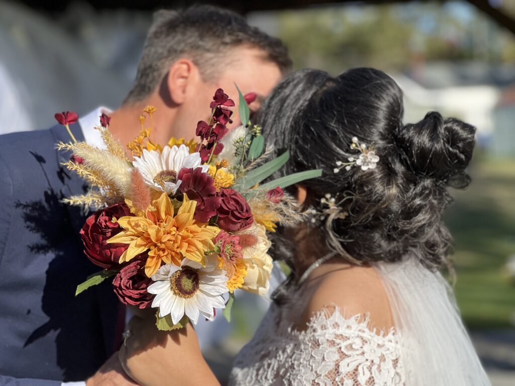 Bridal bouquet using sunflowers and fall colours